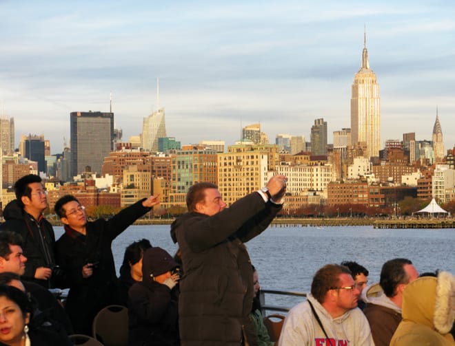 Turistas no cruzeiro Circle Line